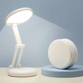 One Fire cordless desk lamp folded into a cookie, travel-friendly for dorm use.