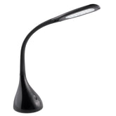 OttLite Creative Curves lamp base enabling stable desk setup for focus tasks.
