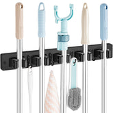 OUTNILI mop and broom holder wall mount keeps tools within reach and tidy.
