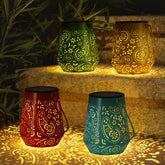 OxyLED red hanging solar lantern with warm light for garden ambience.