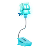 Paladone Minecraft Allay clip-on light highlights pages for easy late-night reading.