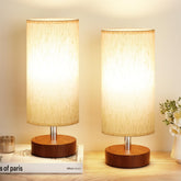 PartageiZ small table lamp on a bedside setup with warm, cozy glow