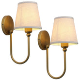 Pathson antique linen sconce curved-arm front view delivering warm, diffused lighting for intimate bathrooms.