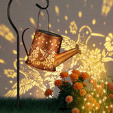 Pawatee Solar Watering Can Light hanging lantern adds charming garden ambiance.