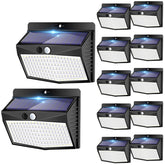 Peasur solar outdoor lights 12-pack illuminating pathways at night