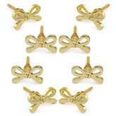 Perilla Home brass bow knobs eight-pack on display for cabinets, premium hardware upgrade