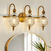 Piepooye vintage bathroom light with three-globe design brightens bathrooms with warm ambience.