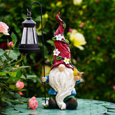 Pohabery Christmas gnome with solar lantern lighting the outdoor garden