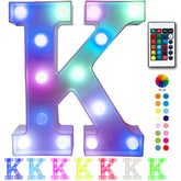 Pooqla colorful LED marquee letters illuminate a bar sign with vibrant multicolor glow.