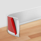 POPAKAN flexible baseboard molding on white wall for clean lines.