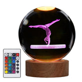 POSSHE gymnastics night light crystal ball glows warmly to illuminate a shelf