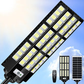 PQINS 12000W solar street light showing broad bright coverage for large outdoor spaces