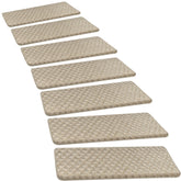 PURE ERA bullnose stair treads in cream gray with mini-diamond trellis protect wooden steps.