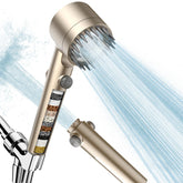 PWERAN filtered shower head front view with golden finish for modern bathrooms.