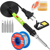 Q-MING 60W soldering iron close-up showing quick heat for electronics repairs.