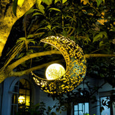 QCF crescent moon solar light for garden ambiance at night.