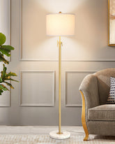 Qingmiao gold floor lamp base detail adds chic modern style to living rooms.