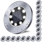 Rayolon solar ground light with 8 LEDs brightening a garden path