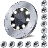 Rayolon solar ground light lighting a pathway with bright white illumination at night