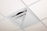 Receilit corner air diverter triangle on a 2x2 diffuser for targeted airflow.