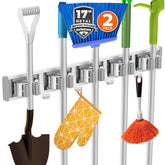 Reliahom broom holder wall mount in silver showing organized space for tools