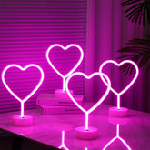 Retisee pink heart neon sign in front view, bright ambient light for romantic room decor.