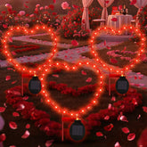 Retisee Valentine heart solar light assembly illuminates outdoor path with warm, inviting glow.