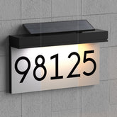 Reveforly solar-powered address sign with adjustable panel for optimal sun charging.
