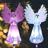 Rirool Angel Solar Light for cemetery illuminates walkways after dusk.