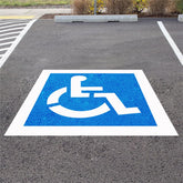 RoadAlchemist handicap stencil setup on pavement for precise ISA symbol and ADA compliance.