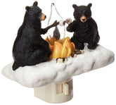 Roman Lights exclusive night light with bears roasting marshmallows around a flickering campfire for cozy ambiance.