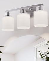 Sailstar 3-light vanity fixture over mirror with brushed nickel finish for soft, even brightness.