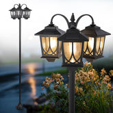 SAKSIAPRO 3-head solar lamp post lights the garden path with warm 3000K glow.