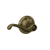 Schlage F40V Flair antique brass finish privacy lever for bedroom and bath doors.