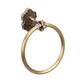 SDH vintage brass towel ring on wall for elegant bathroom storage.