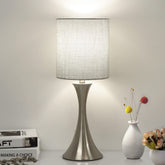 Seaside Village three-way touch lamp base offers steady support for bedside reading.