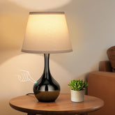 Seealle touch table lamp on nightstand with easy brightness control.