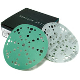 Serious Grit 6in 49-hole 180-grit disc on Festool sander delivering a smooth finish.