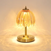 Shenmoyl Tulip Table Lamp with amber shade, front view showing warm glow