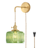 Shenmoyl vintage wall sconce with green-striped shade adds warm bedroom lighting.