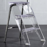 SHYM transparent acrylic 3-step ladder open for reaching shelves.