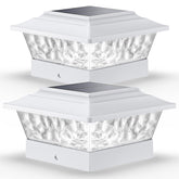 SIEDiNLAR solar post lights with 12 LEDs brighten fence posts outdoors.