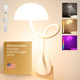 Smallish Shroommate clip-on light attached to a bed rail for dorm room convenience.