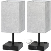 Soilsiu bedside lamp with grey shade and black base for soft, eye-friendly lighting.