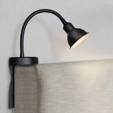 Solfres headboard light fits gap, no drilling, ideal for bedside reading.