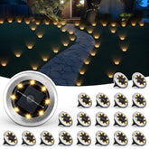 SOLPEX mini solar ground light with stake for garden ambiance at night.