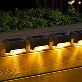 SOLPEX solar deck light with warm white glow for safe path lighting.
