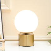 SOTTAE 9-inch modern gold globe lamp with brass base adds stylish bedside ambiance.