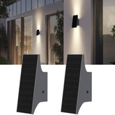 SOTTLOT solar sconce with up-down glow for balanced outdoor illumination.