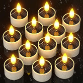 SoulBay solar tea light glows at dusk to dawn along a garden path.